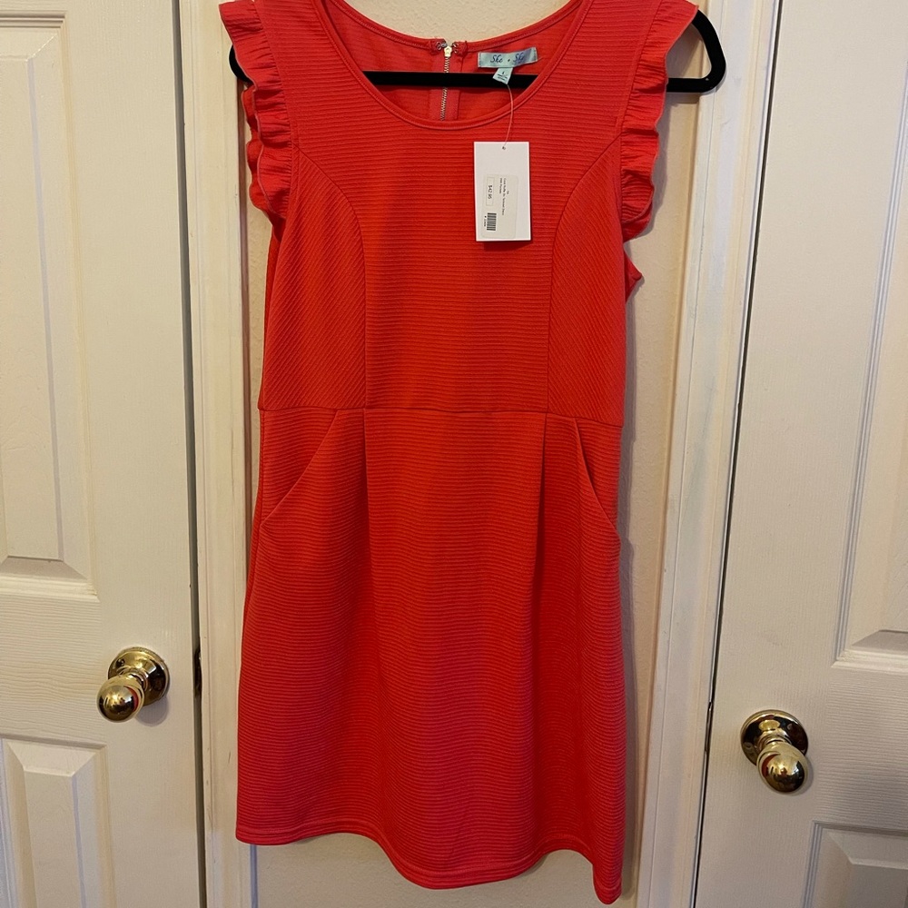 Brand NWT Coral Dress with pockets- from boutique. Size large